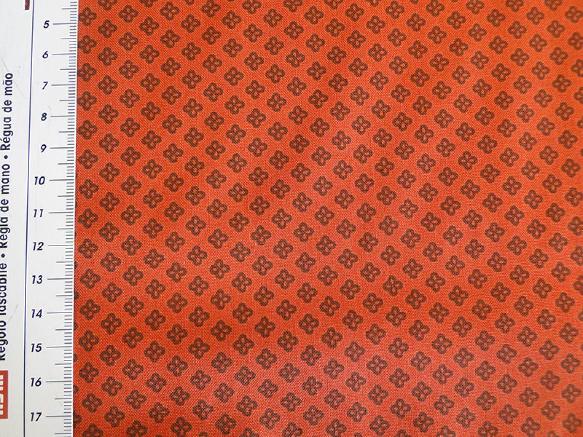 Patchworkstoff in rost mit Maß.
